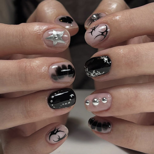 Artful nail design with elegant black and white design Bowlift