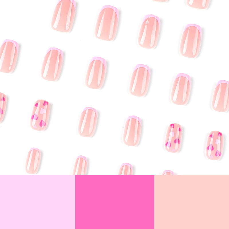Elegant Nail Art with Heart Motifs Bowlift