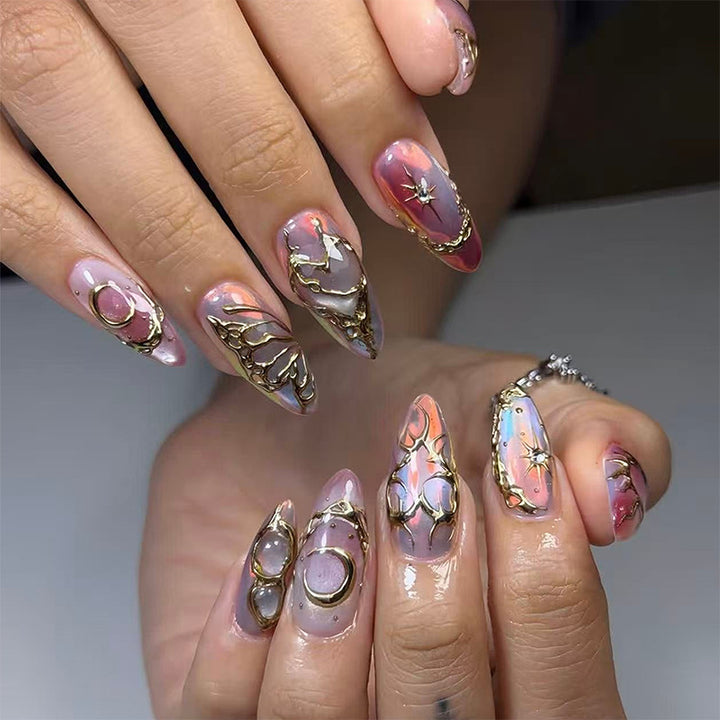 Acrylic nail set with glamorous 3D designs and elegant gold accents Bowlift