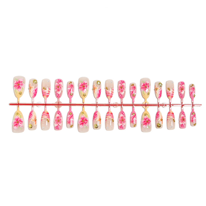 Artificial nails with floral embellishments and glitter accents Bowlift