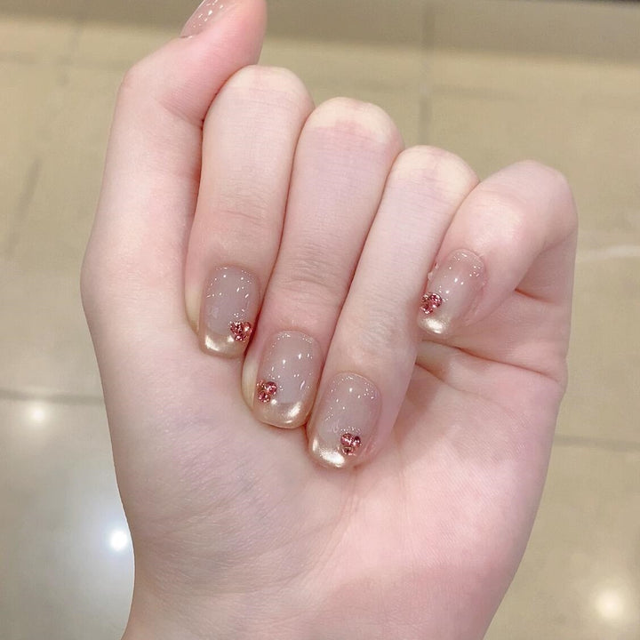 Artificial nails with elegant glitter details Bowlift