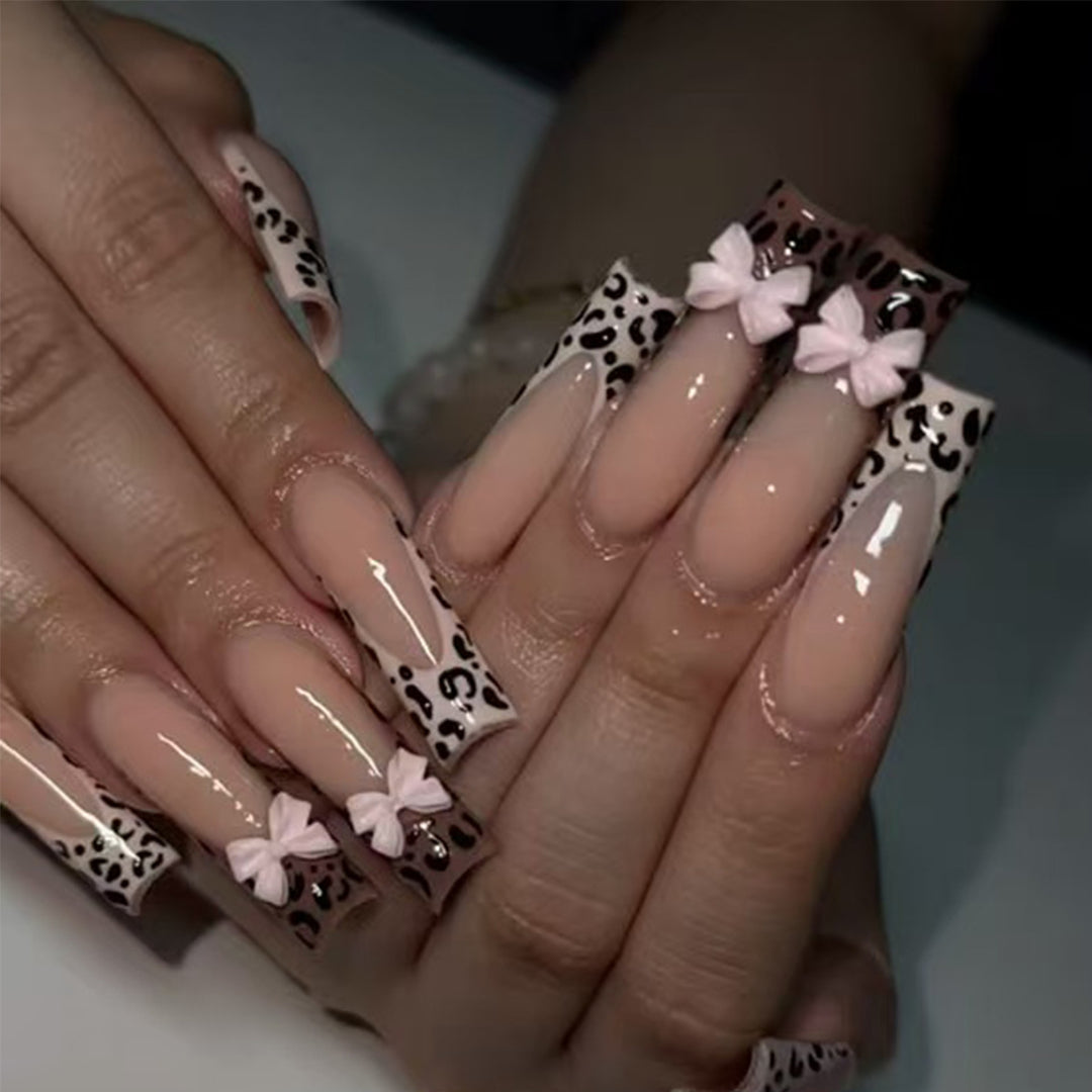 Decorative Stiletto Nail Extensions with Bow Accents Bowlift