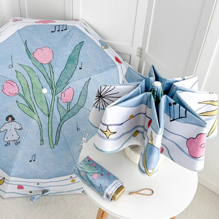 Women's Folding Umbrella with Playful Cartoon Design Bowlift