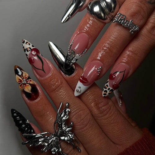 Artful Stiletto Fingernails with Unique Design Elements Bowlift