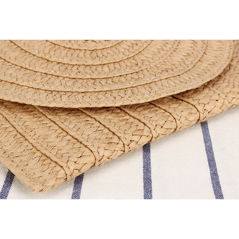 Shoulder bag made of braided natural material with original wave pattern Bowlift