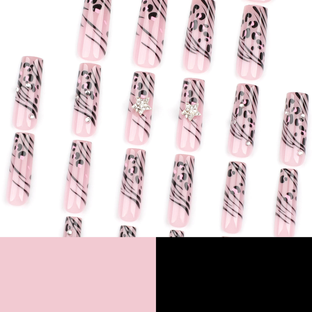 Artful Nail Art with Zebra Pattern and Glitter Accents Bowlift