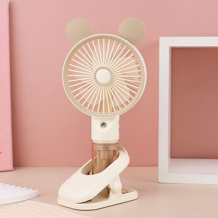 Cooling compact rechargeable clip-on misting handheld fan with detachable water reservoir and adjustable tilt Bowlift