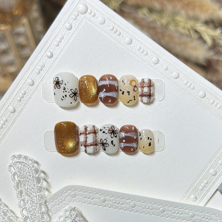 Artistic Press-On Nail Set with Unique Design Elements Bowlift