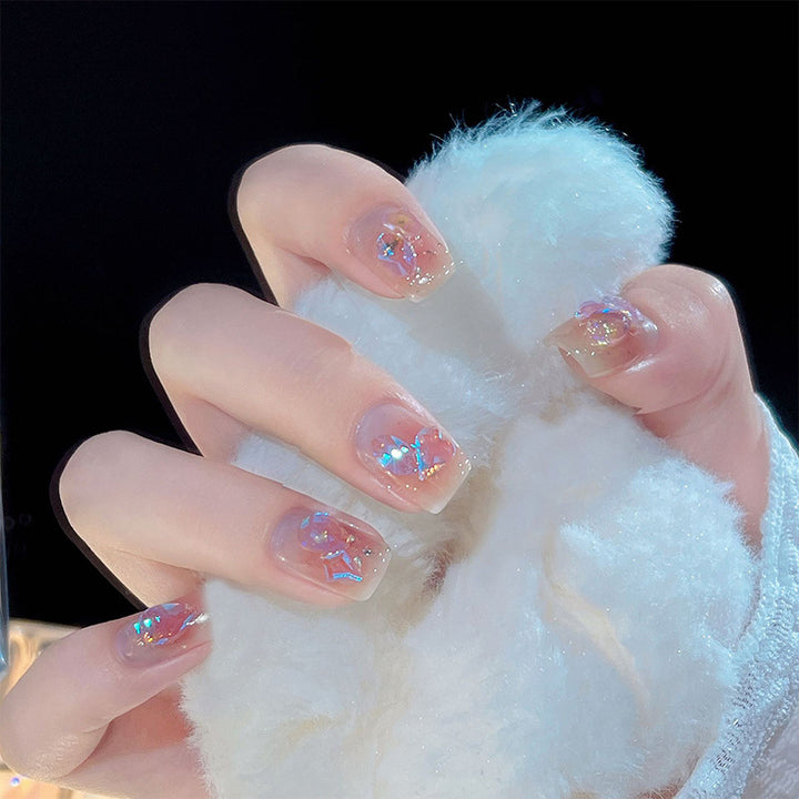 Nail set with sparkling 3D applications and romantic elements Bowlift