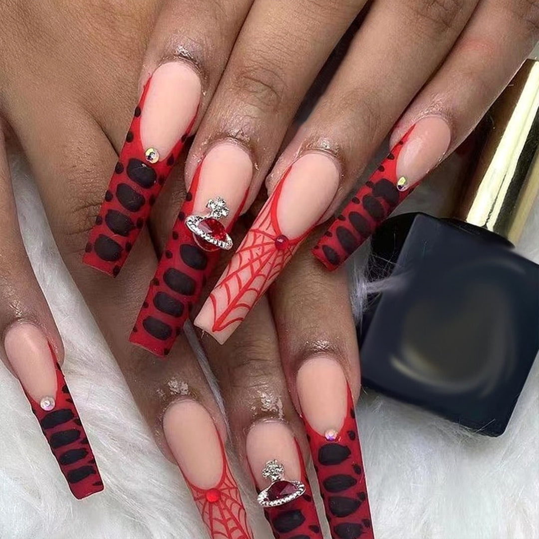 Creative nail set with Halloween motifs and glitter accents Bowlift