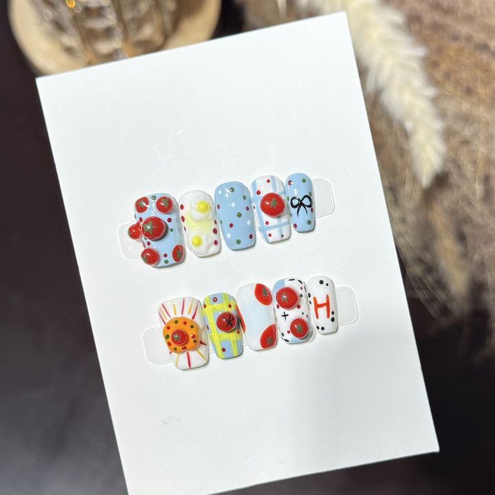 Artistic Press-On Nail Set with Playful Floral and Polka Dot Designs Bowlift