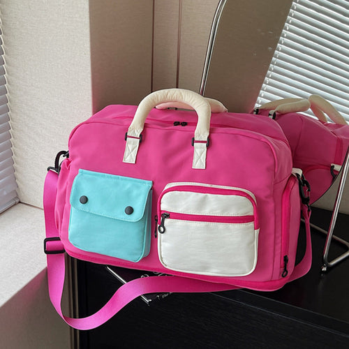 Sporty travel bag with multifunctional outer pockets Bowlift