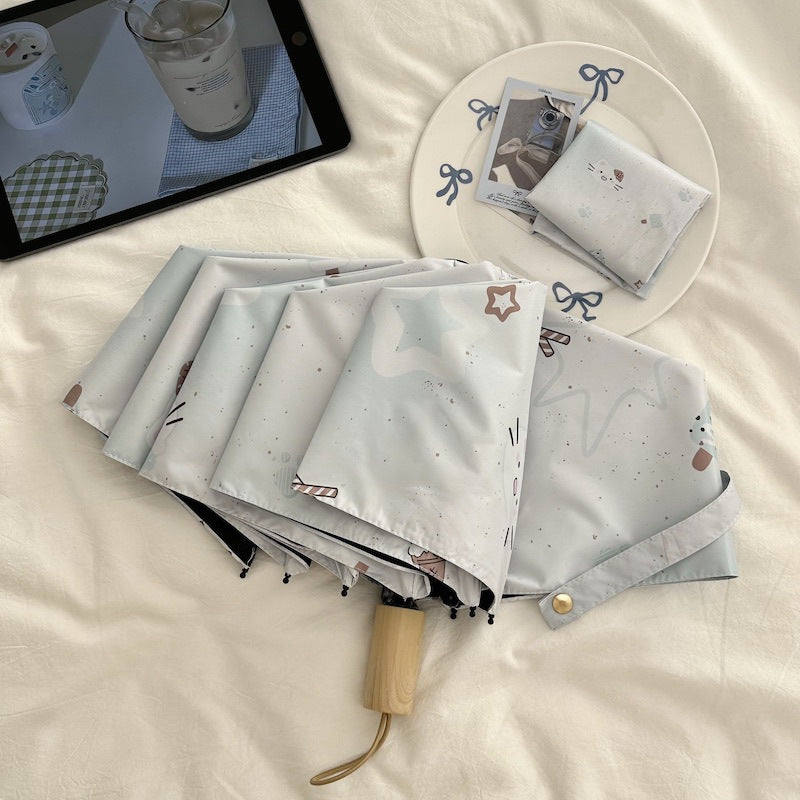 Women's compact folding umbrella with cute Bowlift motif