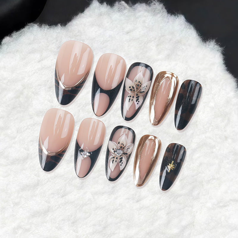 Artistic Press-On Nail Set with Elegant Floral and Abstract Designs Bowlift