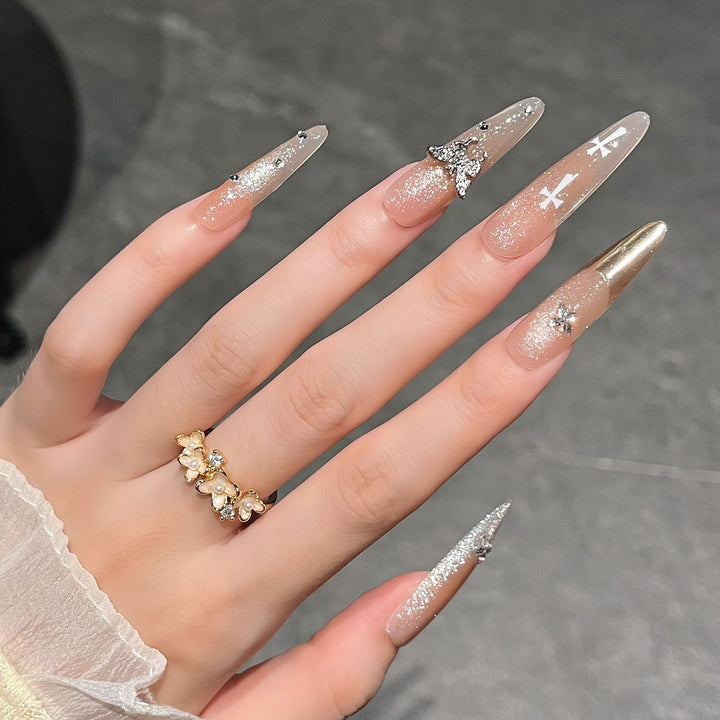 Elegant Stiletto Press-On Nail Extensions with Gem Accents Bowlift