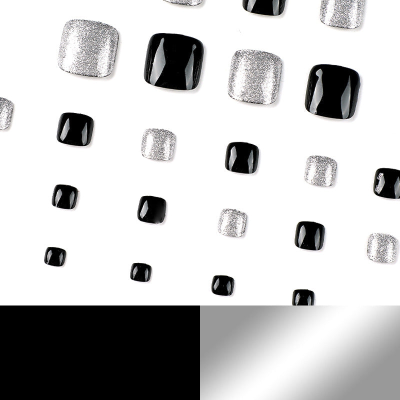 Artful toenail art with glitter and black design Bowlift