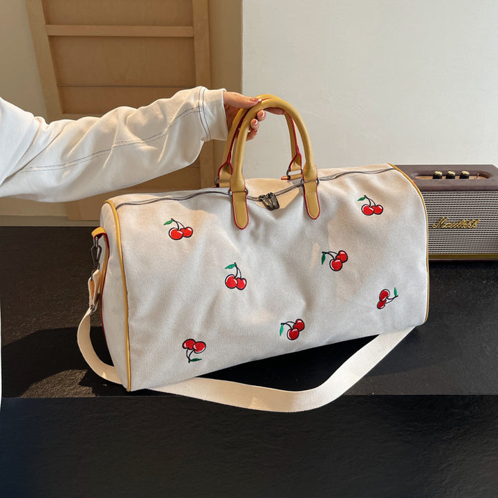 Sporty weekend bag with playful cherry pattern Bowlift