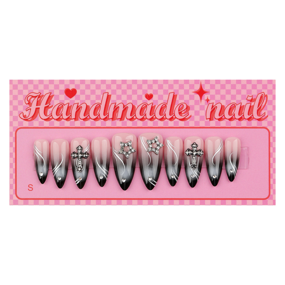Artistic stiletto nails with elegant glitter design Bowlift