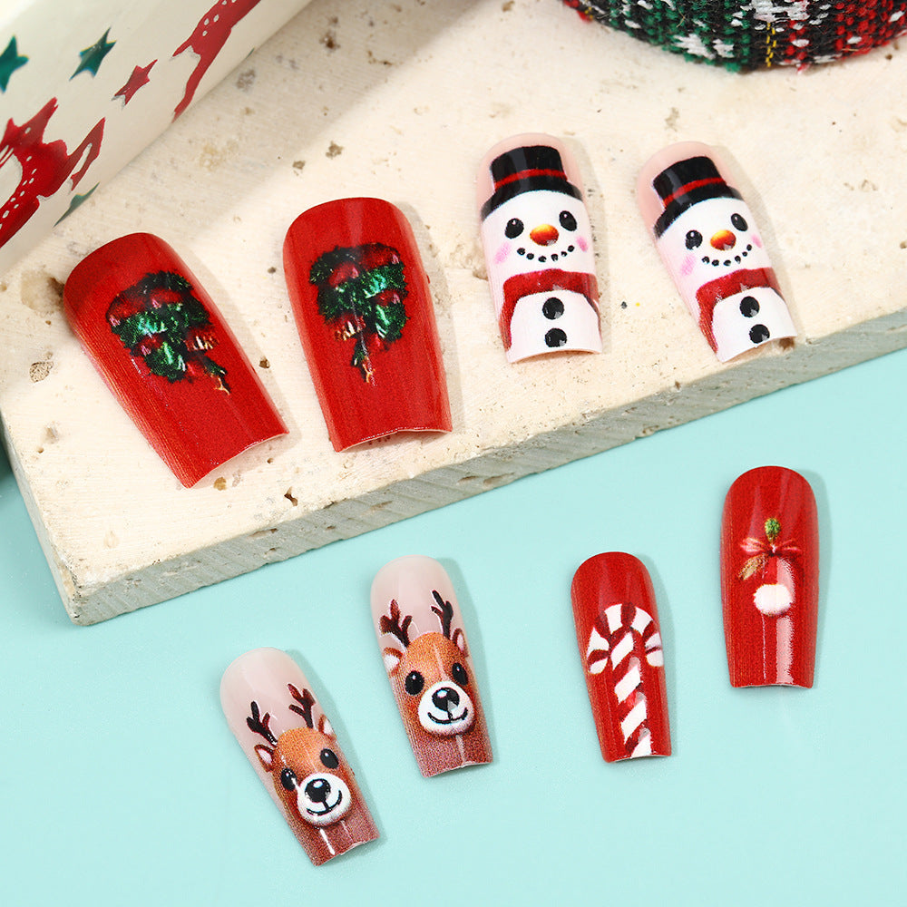 Festive artificial nails in Christmas design Bowlift