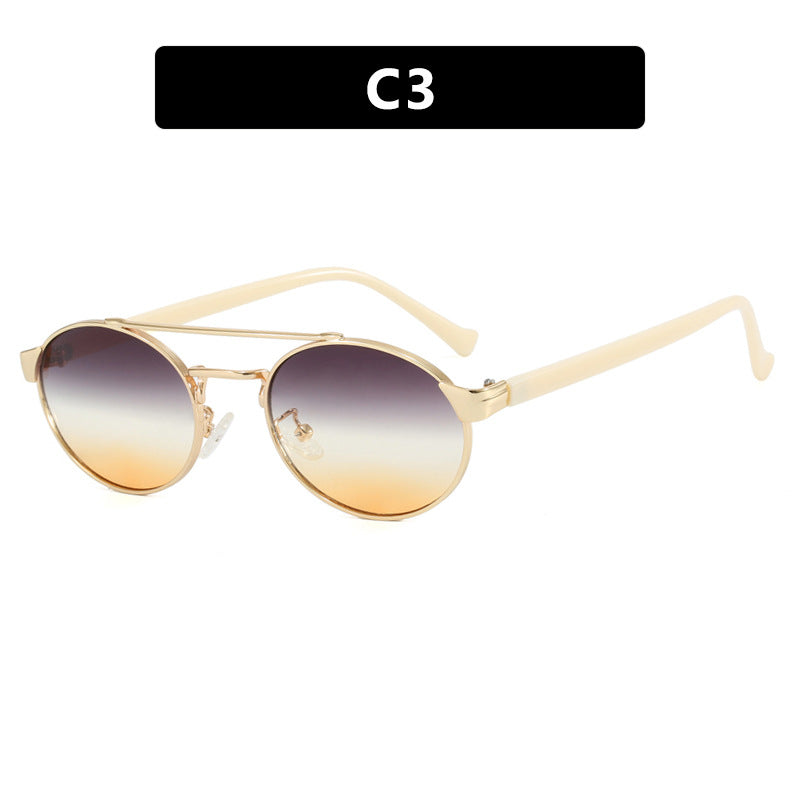 Ladies fashionable sunglasses in stylish round design with golden accents Bowlift