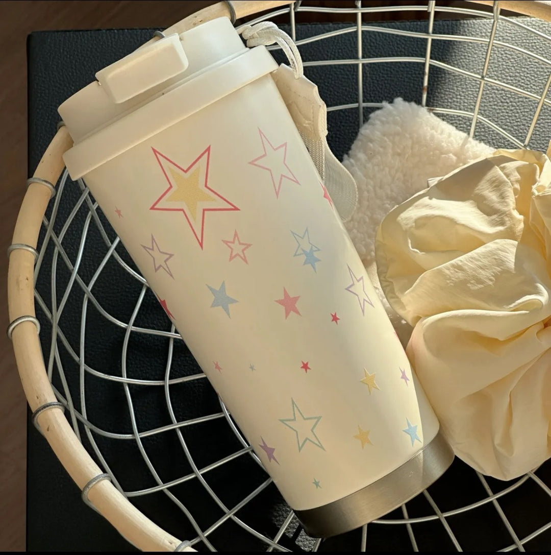 Women's insulated mug with practical carrying handle and charming Hello Kitty design Bowlift
