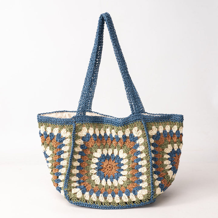 Beach bag made of hand-woven natural material with a square pattern Bowlift