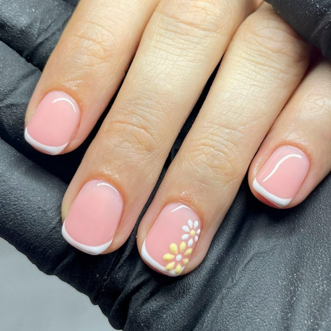 Elegant and creative nail art with floral accents Bowlift