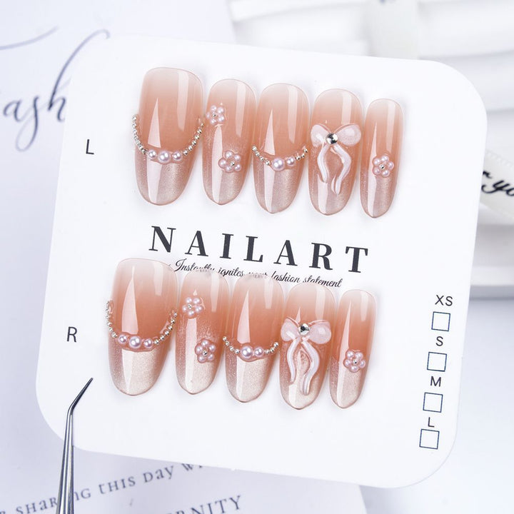 Artistic Stiletto Press-On Nail Set with Floral Embellishments Bowlift