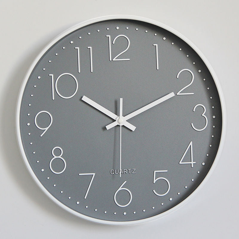 Wall clock in minimalist design Bowlift