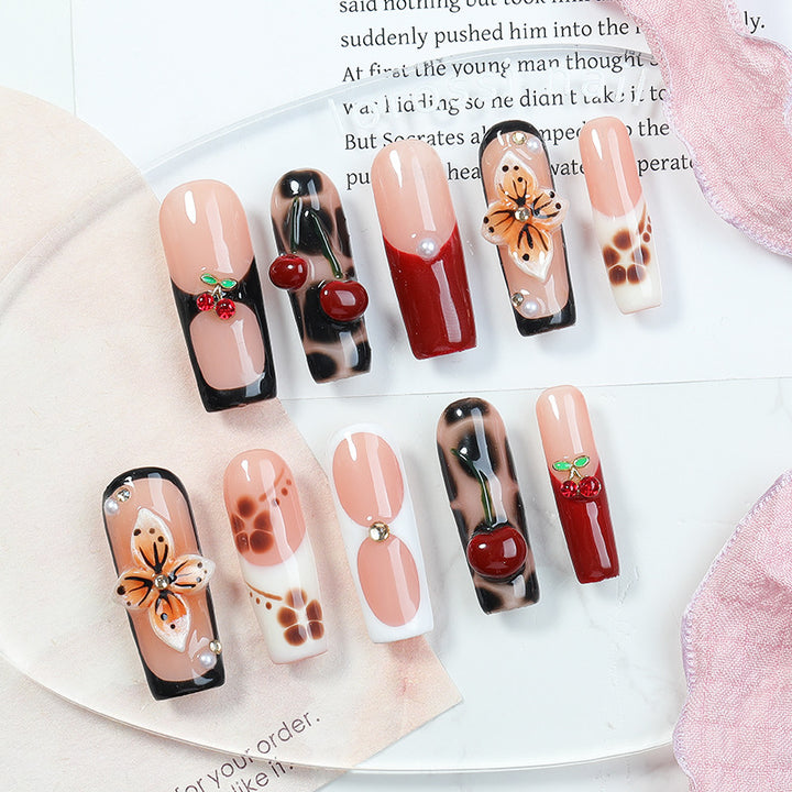 Creative nail art set with floral and fruity accents Bowlift