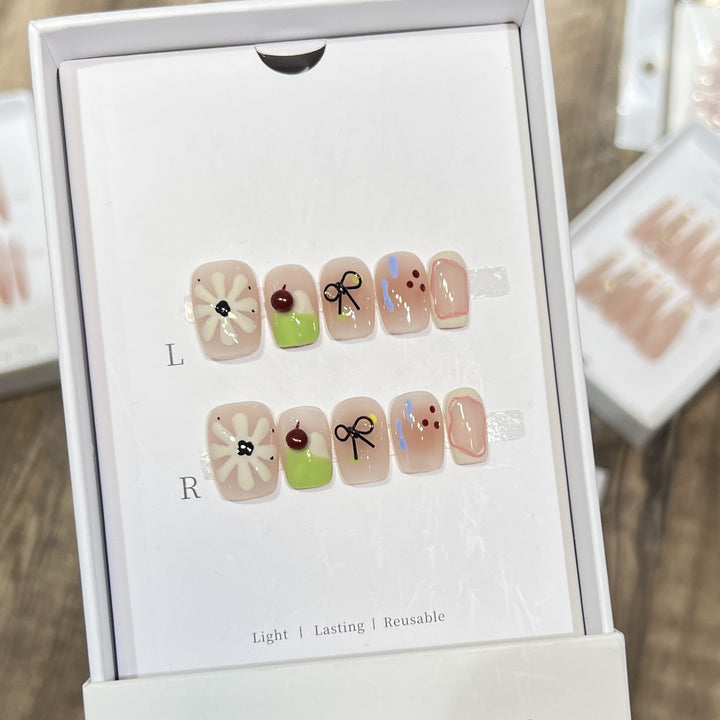 Artistic Floral Press-On Nail Set with Reusable Design Bowlift