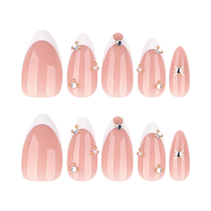 Glamorous nail art with rhinestones and gold accents Bowlift
