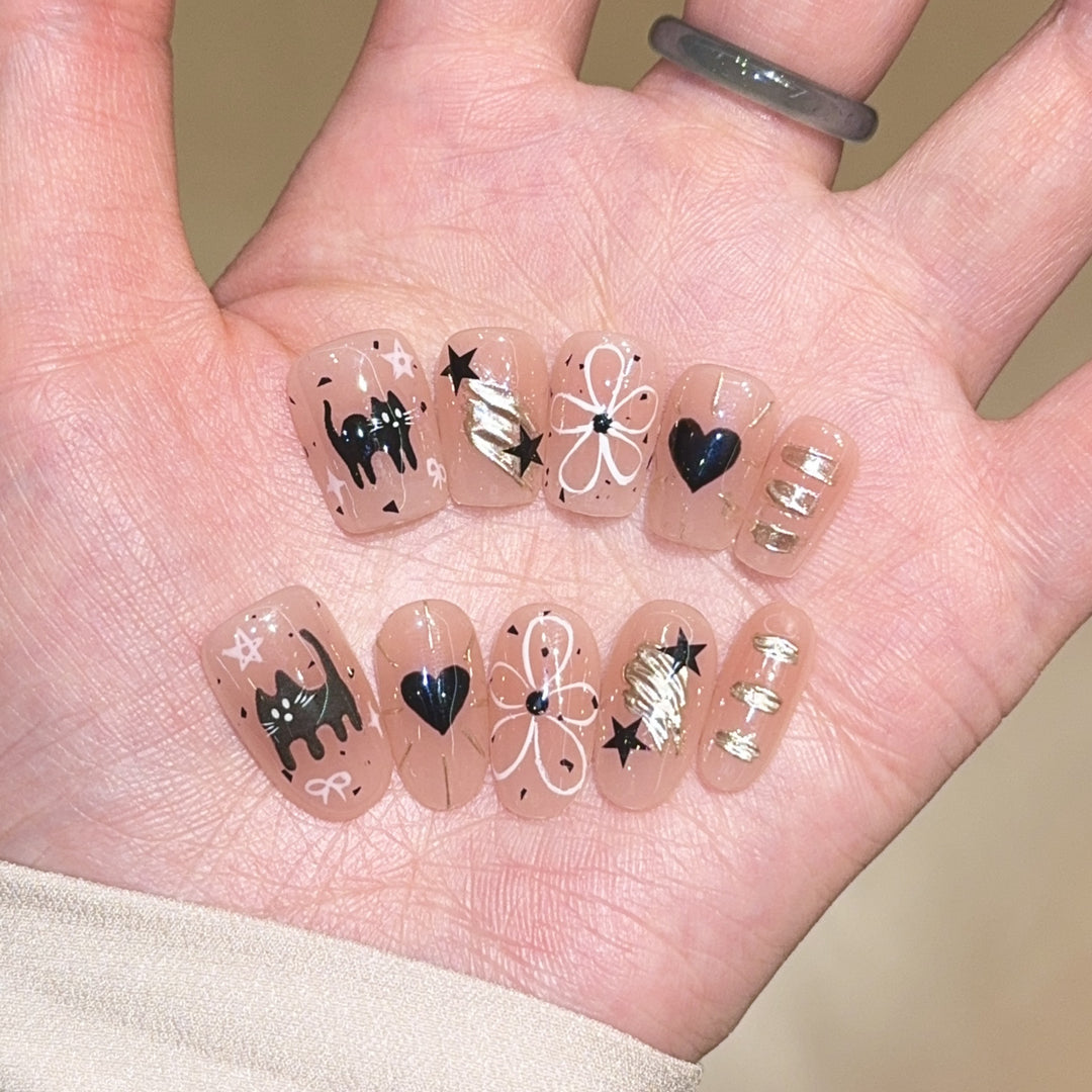 Artificial nails with unique cat and star design Bowlift