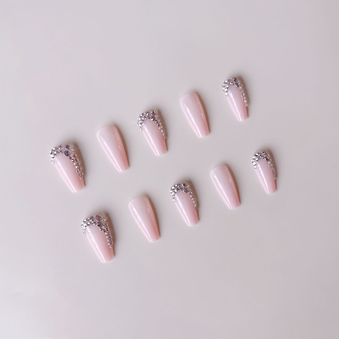 Artificial nail set with glamorous rhinestone embellishments Bowlift