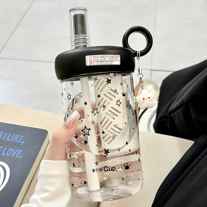 Women’s drinking bottle with integrated fruit filter and charming pendant Bowlift