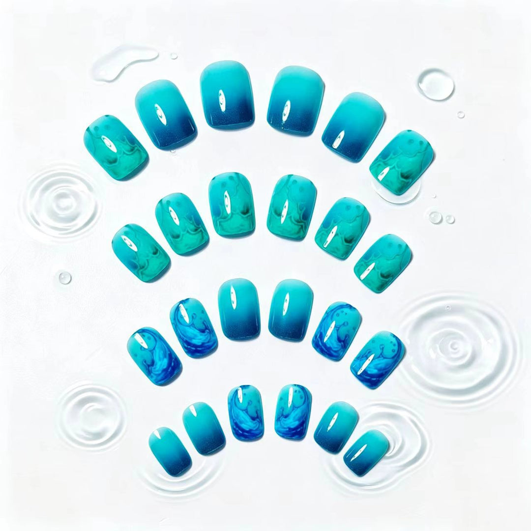 Artificial nails with elaborate wave design Bowlift