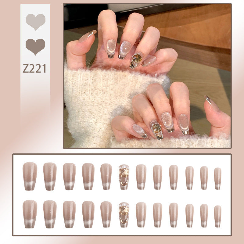 Artificial nail set with glamorous gold and glitter accents Bowlift