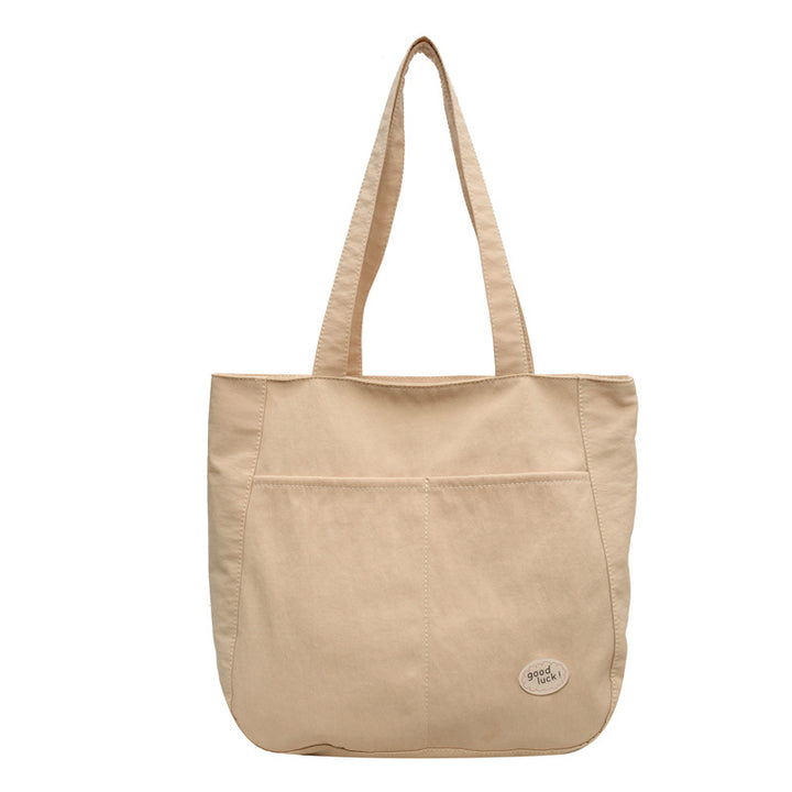 Multi-Pocket Utility Tote Bowlift