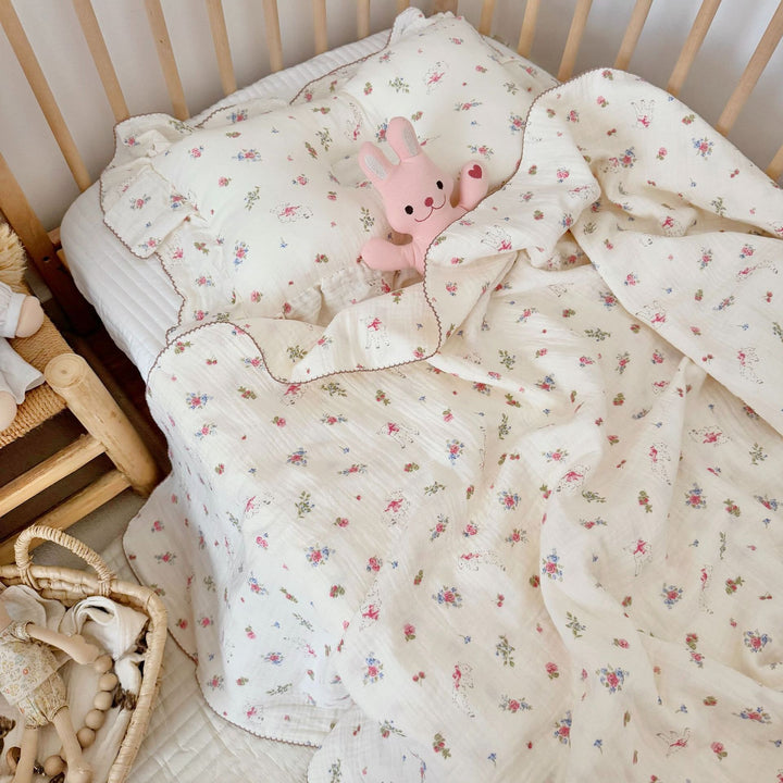 Unisex Muslin Blanket with delicate floral design and elegant ruffles Bowlift