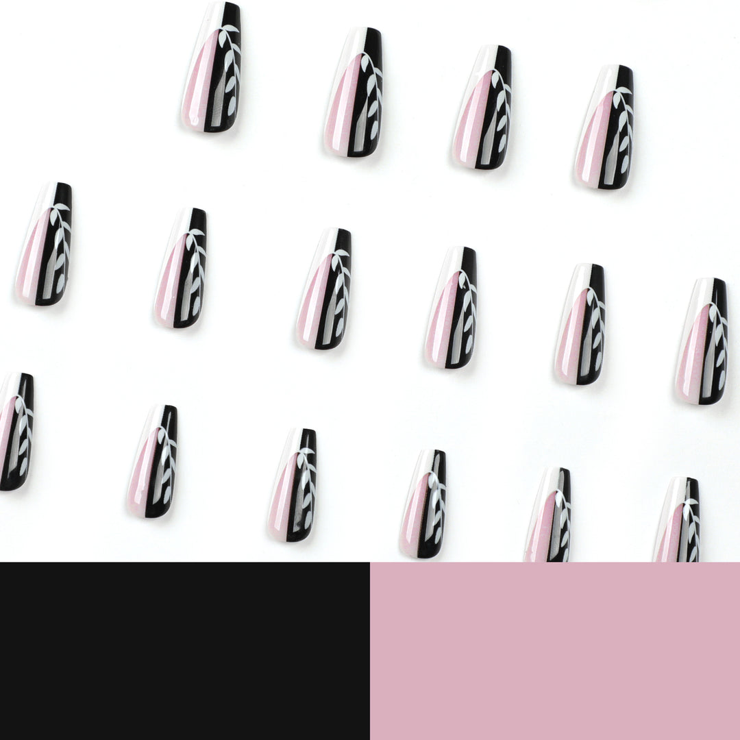 Artful nail extensions in elegant black and white design Bowlift