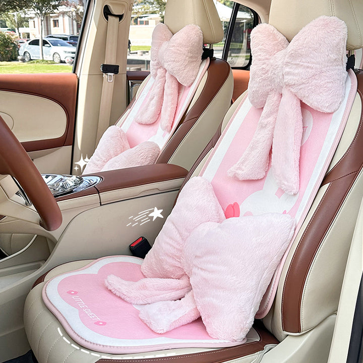plush bow-shaped decorative throw cushion with long tails and faux-fur texture Bowlift