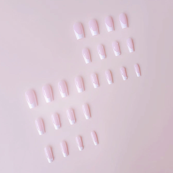 Artificial nail tips with elegant pearl accents Bowlift