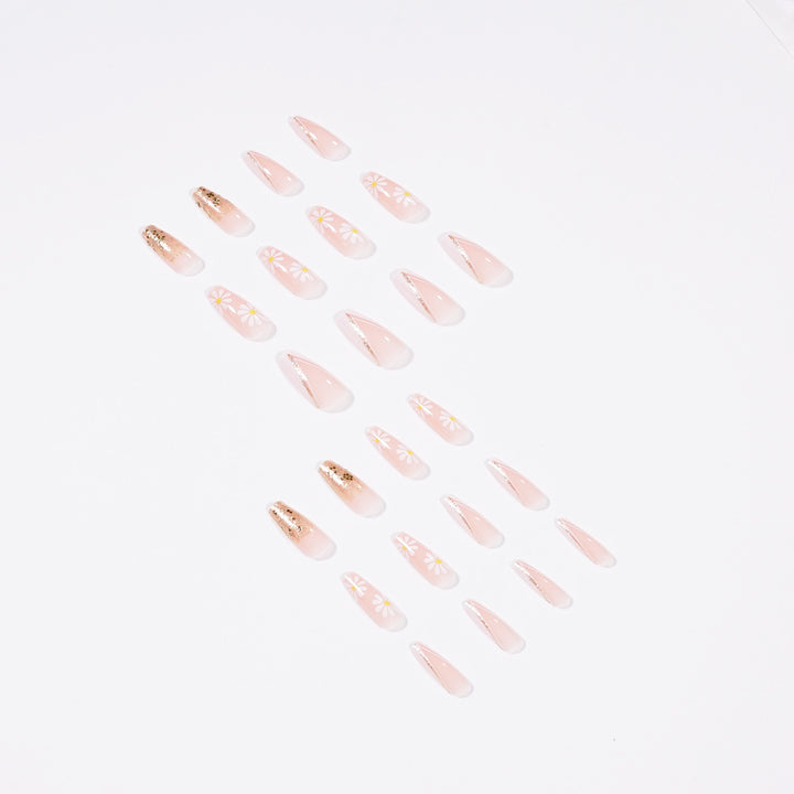 Artful nail extensions with floral designs and glitter accents Bowlift