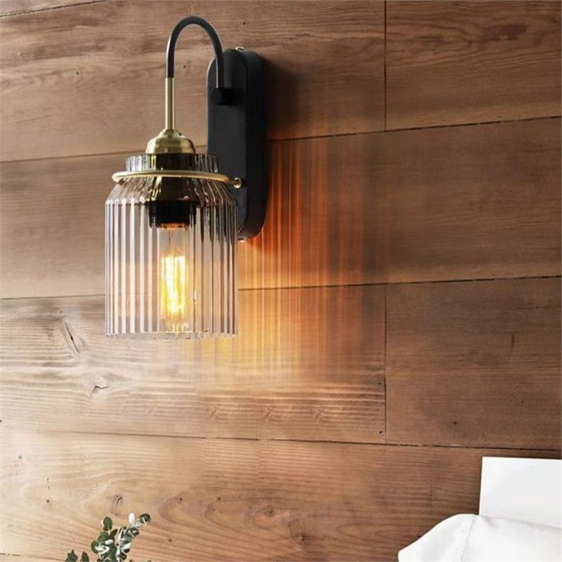 Ribbed Glass Wall Sconce with Curved Arm and Edison Bulb Compatibility Bowlift