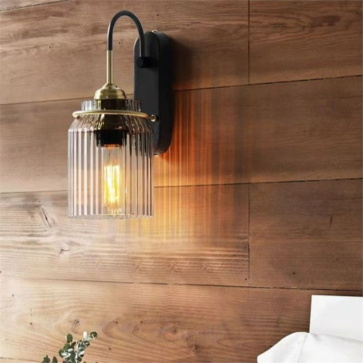 Ribbed Glass Wall Sconce with Curved Arm and Edison Bulb Compatibility Bowlift
