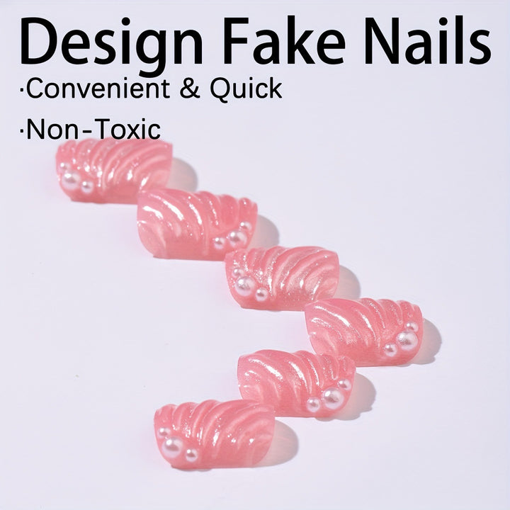 Nail art set with elegant shell designs and glitter accents Bowlift