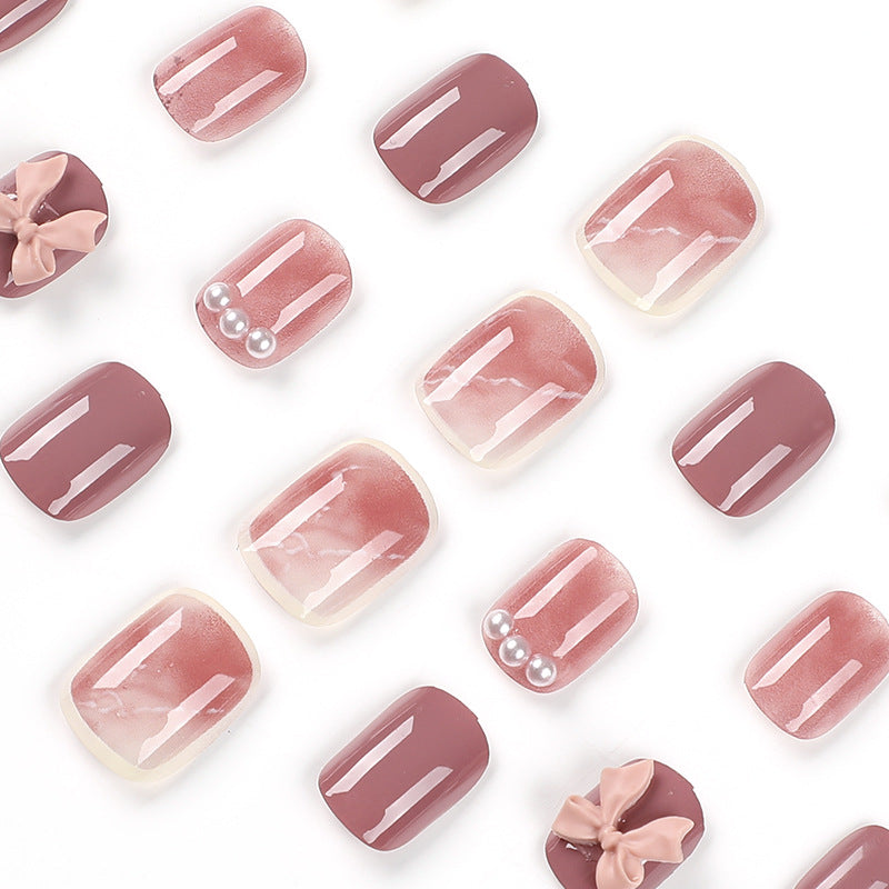 Artful nail art with luxurious 3D bows and elegant accents Bowlift