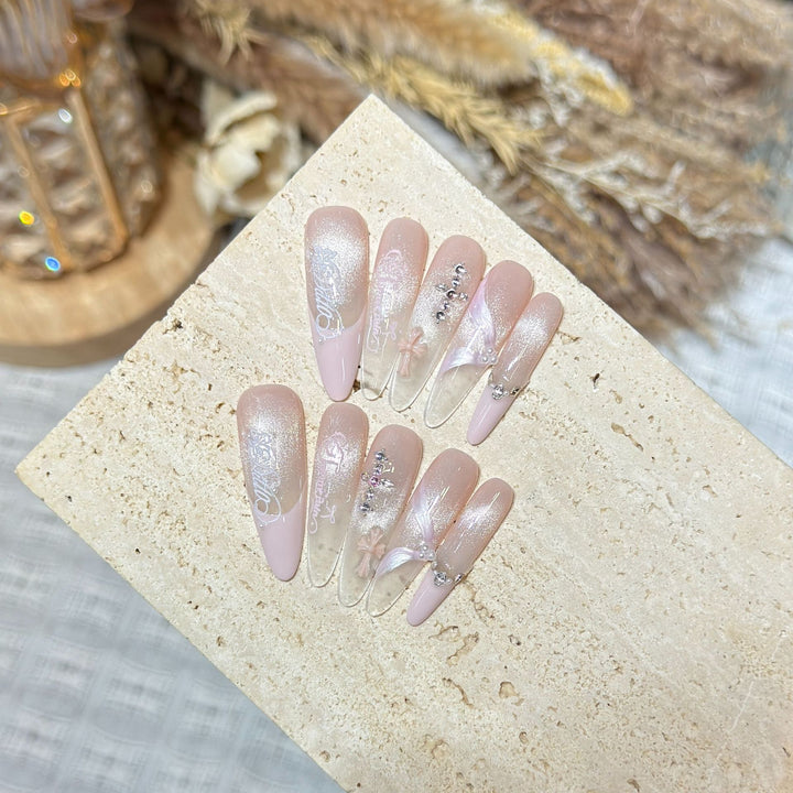Elegant Stiletto Press-On Nail Set with Intricate Designs Bowlift