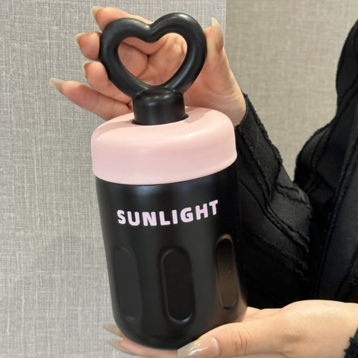 Women's practical drinking bottle with heart handle Bowlift