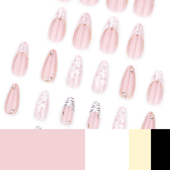 Artful stiletto nails with gold and tip embellishments Bowlift